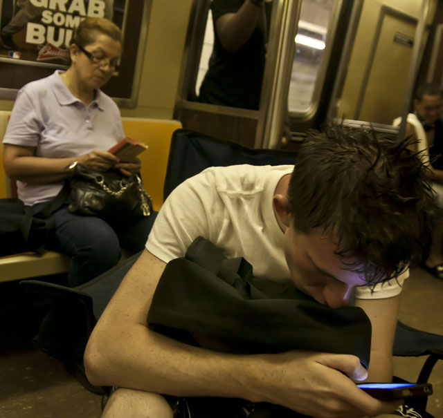 Commuters Using Cellular Phones on NYC Subway, Courtesy of Runs with Scissors