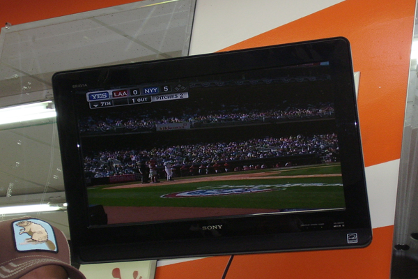 Watching the Yanks at the Eclipse Barber Shop