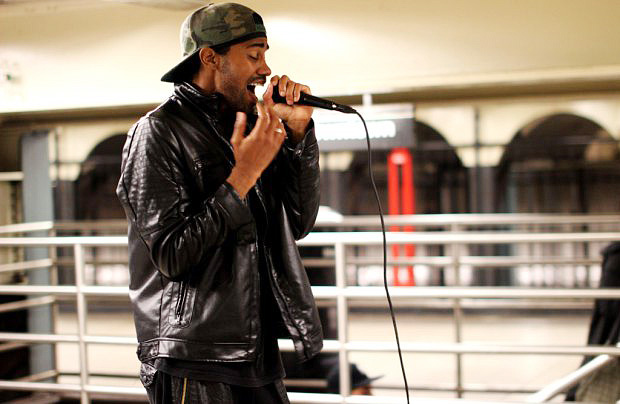 Some do it for money, some do it for fun, but up and coming singer Von Middleton performs in the train station for exposure.